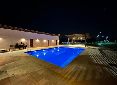 Luxury swimming pool with modern design at Shreeshakti Ultrastructures project in Nagpur.